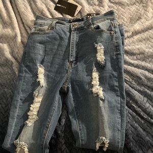 Fashion nova , medium blue washed jeans size 7/8